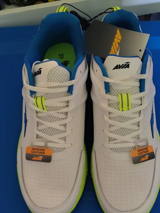 Avia White Sneakers with Blue Lining and Neon Lime Details