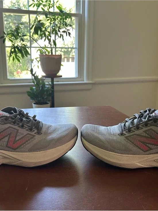 New Balance Gray Sneakers with Red Logo Accent