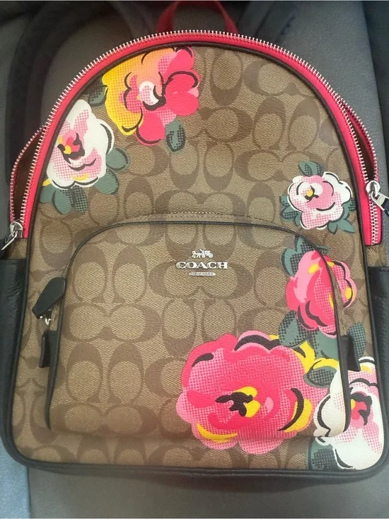Coach Brown Signature Floral Backpack with Pink and Yellow Accents