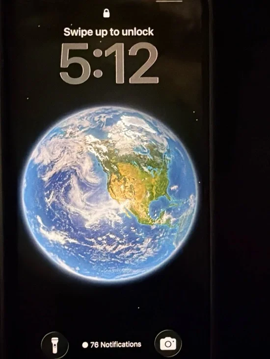 Apple iPhone Black with Blue/Green Earth Wallpaper