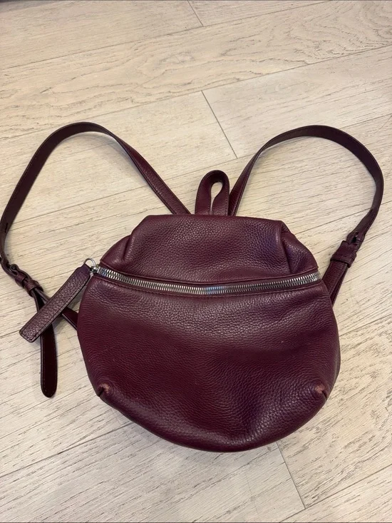 Pebbled Leather Round Backpack in Deep Burgundy