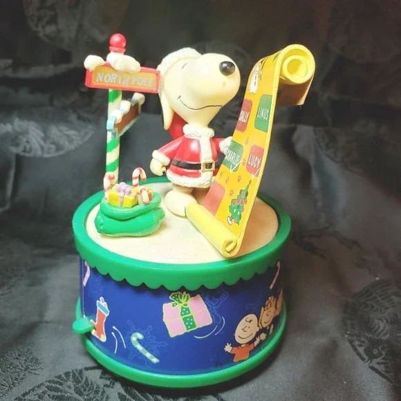 Snoopy as Santa checking his List‎ Music Box Play We Wish You A Merry Christmas