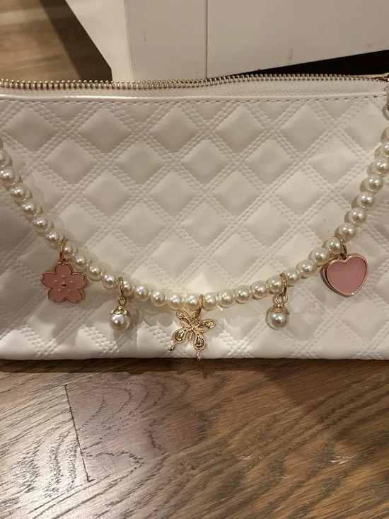 Pearl Charm Quilted White Clutch with Pink Charms