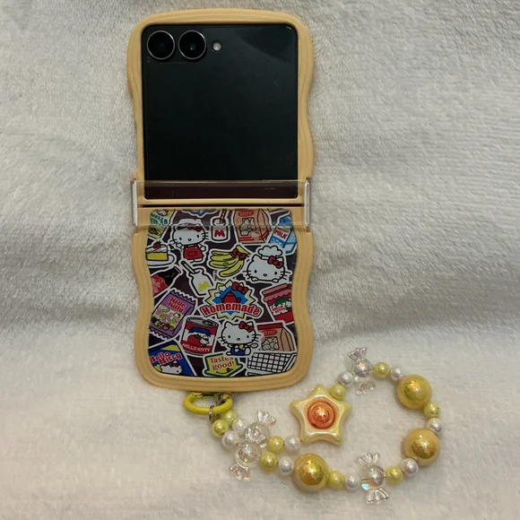 Galaxy Z Flip 7 Hello Kitty Yellow Sticker Phone Case with Beaded Charm