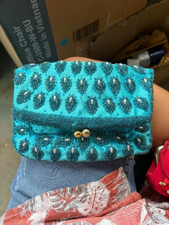 Lite blue beaded purse with clap