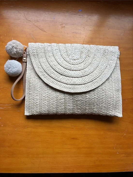 Woven Straw Clutch Wristlet and crossbody bag in Cream.