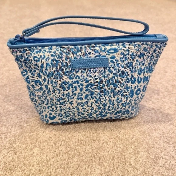 Vera Bradley mesh sequin wristlet on the Camocat blue pattern