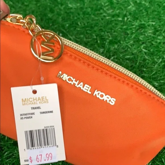MICHAEL KORS TRAVEL XS POUCH Tangerine