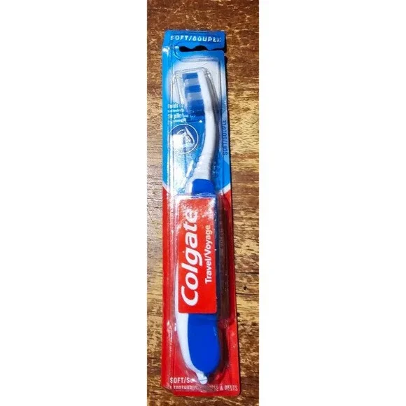Colgate Travel Voyage 90- folding toothbrush (BLUE Handle) NIB