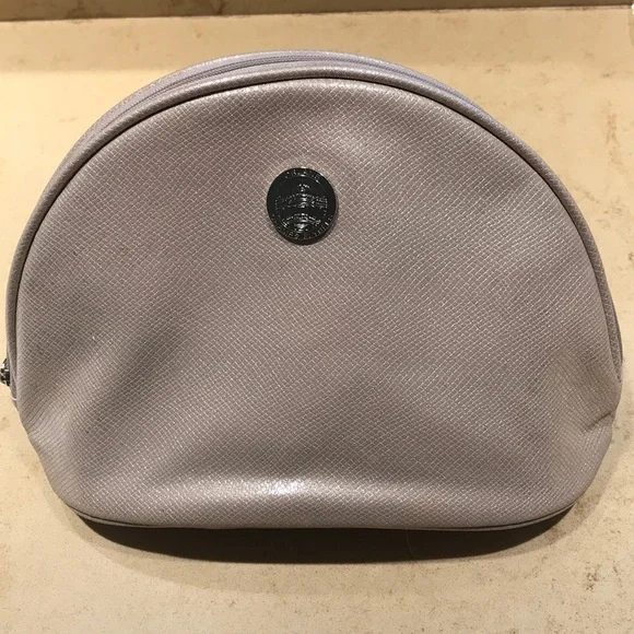 NWOT Orlane Paris taupe shiny cosmetic bag.