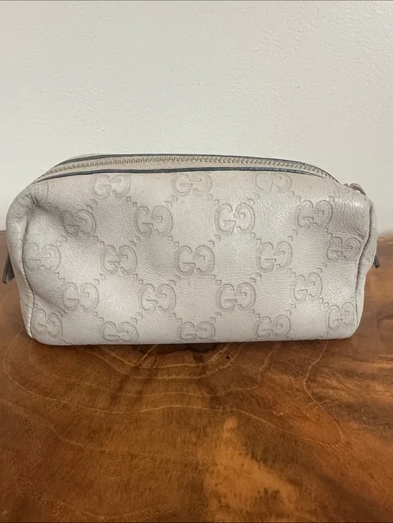 Gucci Embossed GG Leather Pouch
