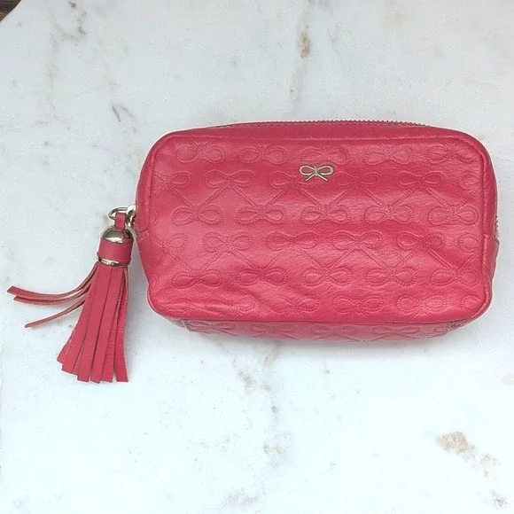 Anya Hindmarch Pink Embossed Bow Leather Cosmetic Makeup Bag Tassel Pouch Clutch