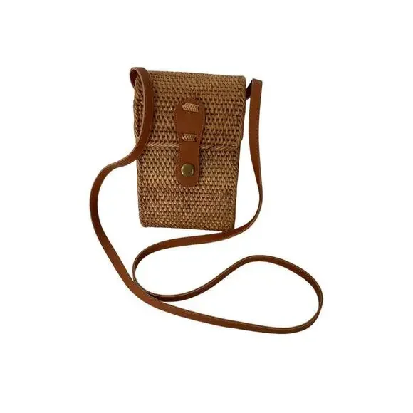 Rattan cross body brown bag with snap front. Size S