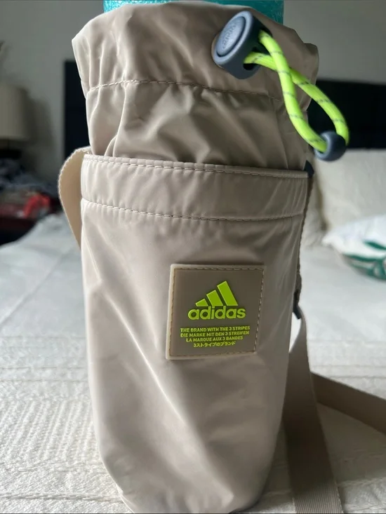 Adidas Beige Hydration Pouch with Neon Green Accent, crossbody
