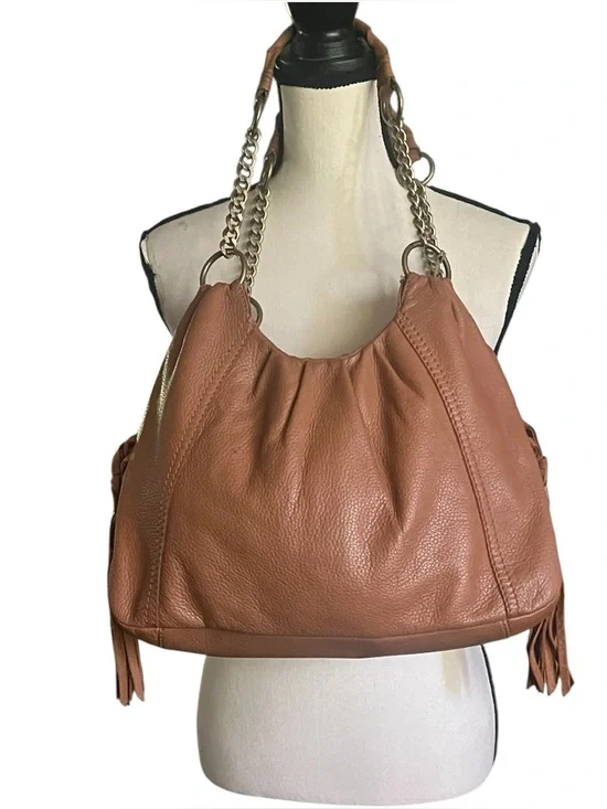 The Sac Pebbled Leather slouchy Hobo Tassel sides  shoulder handbag.