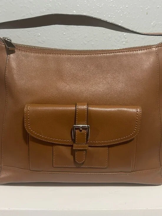Vintage coach leather hobo in color camel with silver hardware.