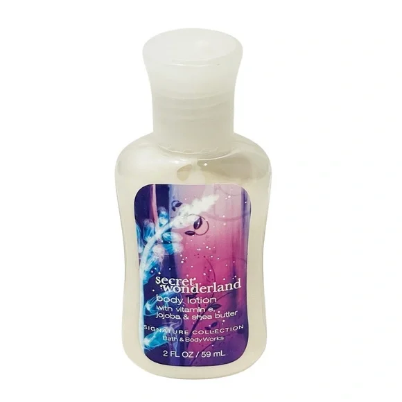 Bath and Body Works Secret Wonderland Body Lotion 2 oz Vitamin‎ E Jojoba Shea