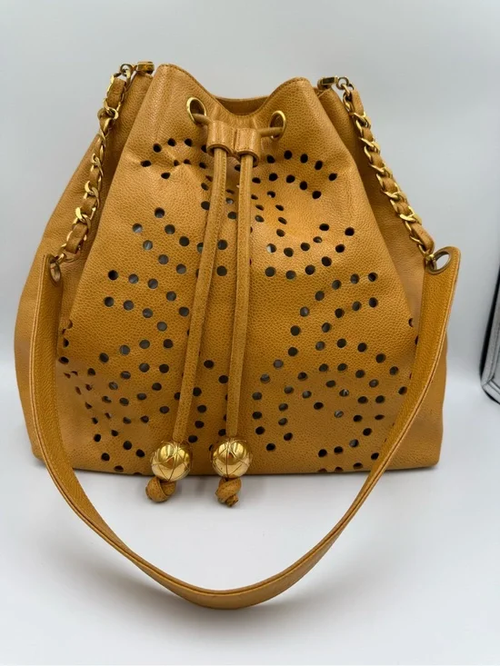 Chanel Perforated Drawstring Bucket Bag in Caviar Leather