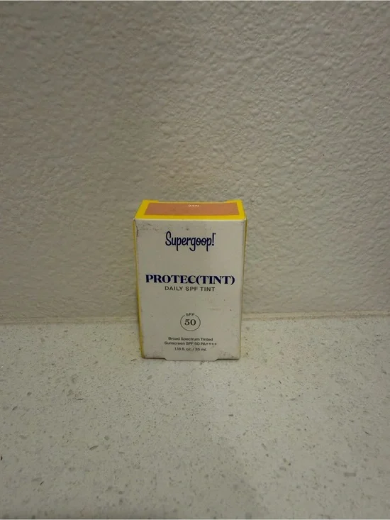 Supergoop! Protect(Tint) Daily SPF Tint - Yellow and White Packaging