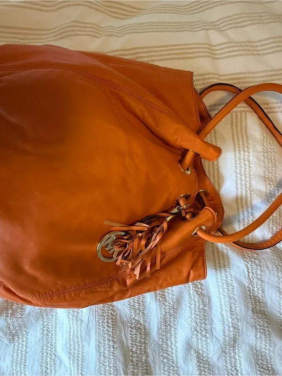 Michael Kors Orange Leather Hobo with Tassel Charm
