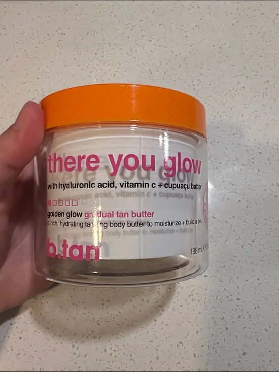 b.tan There You Glow Gradual Tan Butter - White & Pink Jar with Orange Lid