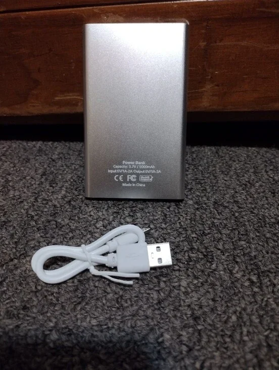 Silver Portable Power Bank with White USB Cable