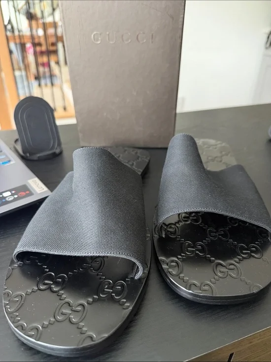 Gucci Men’s Black Embossed Logo Slide Sandals