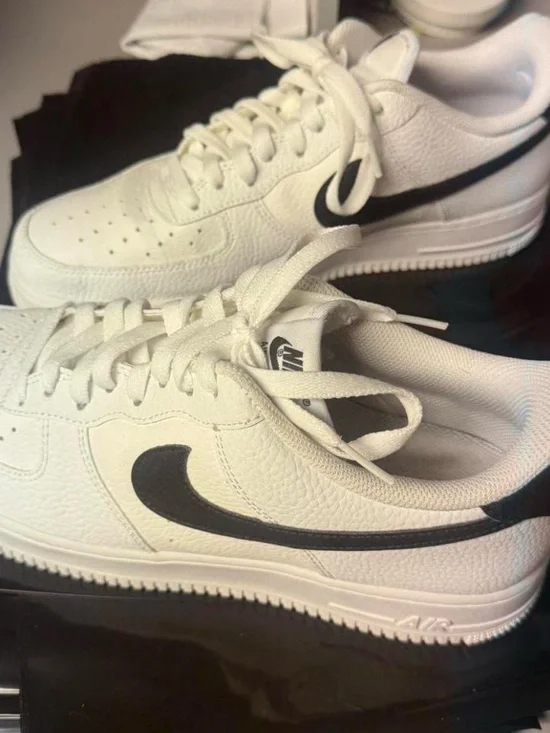 Nike White Sneakers with Black Swoosh