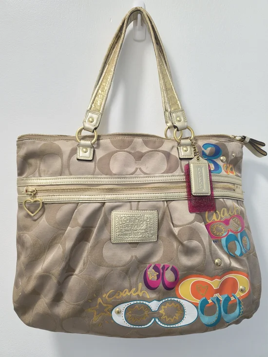 Coach Beige Signature Shoulder Bag with Gold Straps and Colorful Graphic Accents