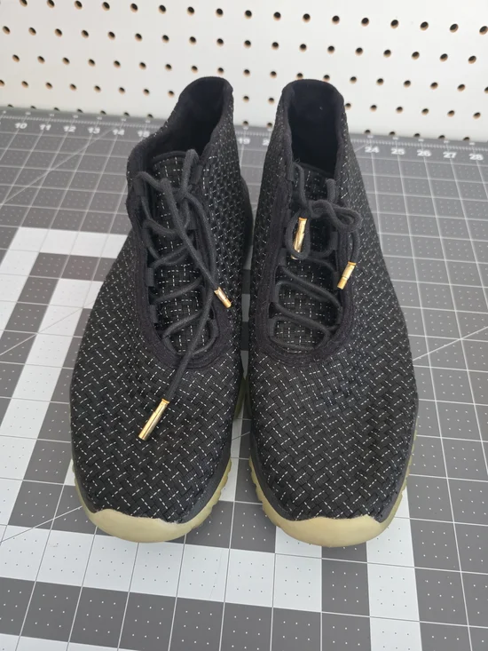Jordan Men's Black Knit Sneakers with Gold Accents