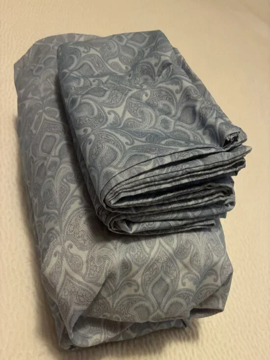 blue swirls.Queen size sheet set - 2 pillows, one flat and one fitted sheet poly