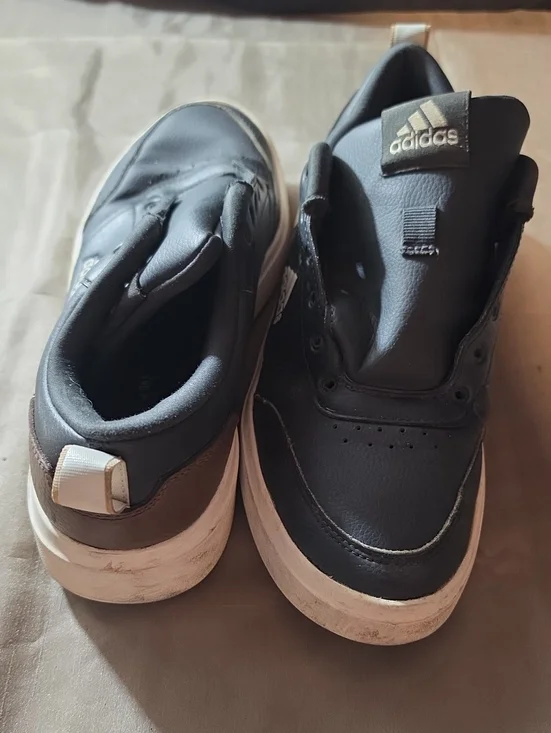 Adidas Black Sneakers with White Soles and Brown Heel Accent