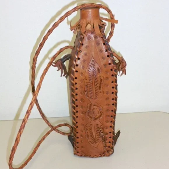 Vintage HAND TOOLED bird LEATHER BOTTLE HOLDER strap barware
