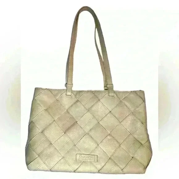 An American Leather Co. nude/cream colored leather woven tote bag.