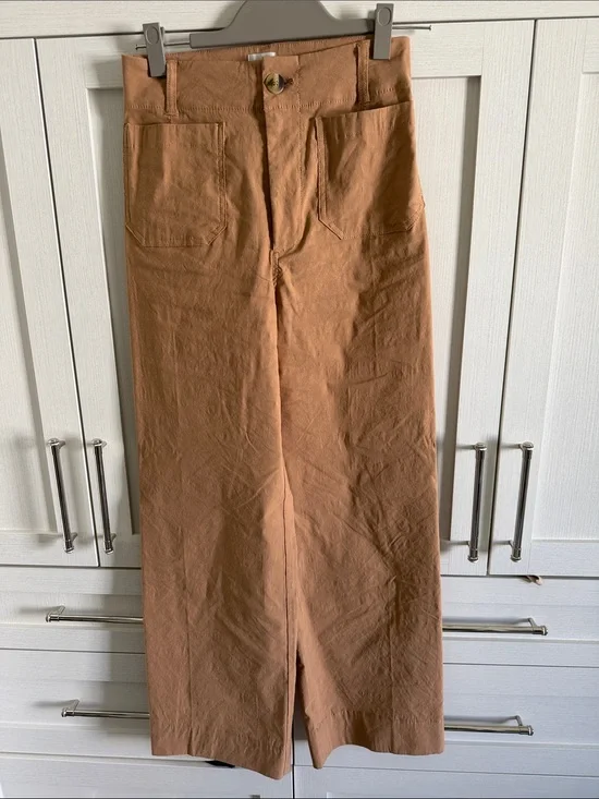 Maeve Colette in Tan