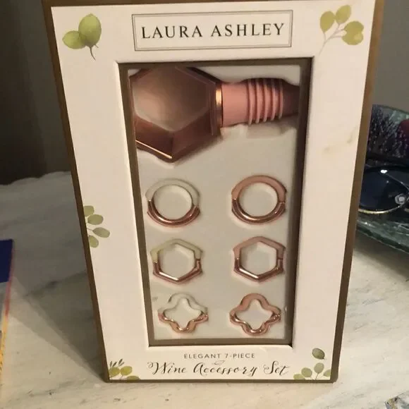 NEW Laura Ashley Seven piece rose gold wine accessory set.