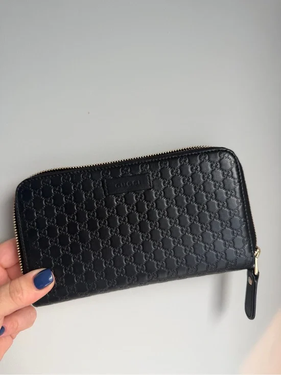Gucci Black Embossed GG Leather Zip Wallet with Gold Hardware