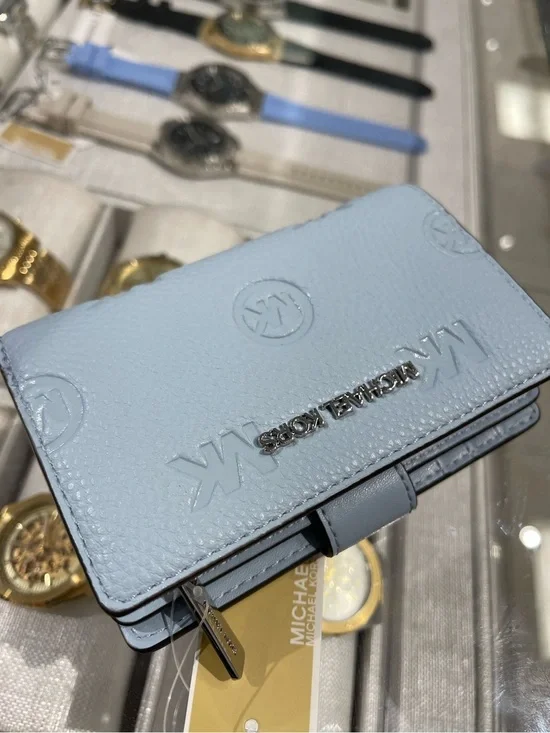 Michael Kors Jet Set Travel Med MK Logo Debossed Bifold Wallet Pale Ocean  NWT