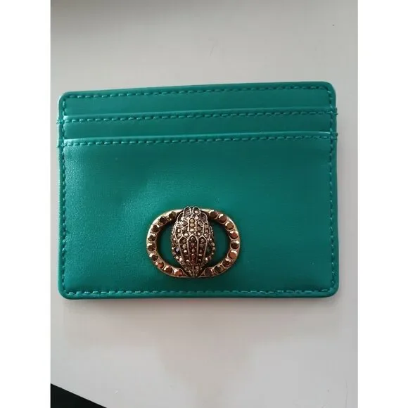 Kurt Geiger teal card holder with gold-tone beetle detail. Orange available too
