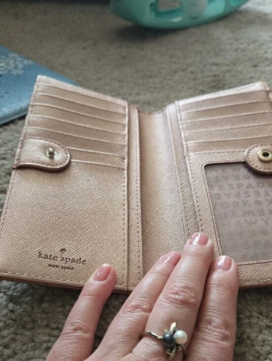kate spade Rose Giold wallet with gold-tone hardware