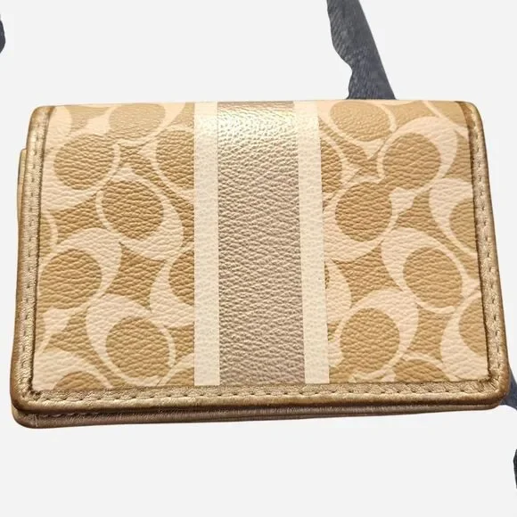 coach gold leather stripe wallet