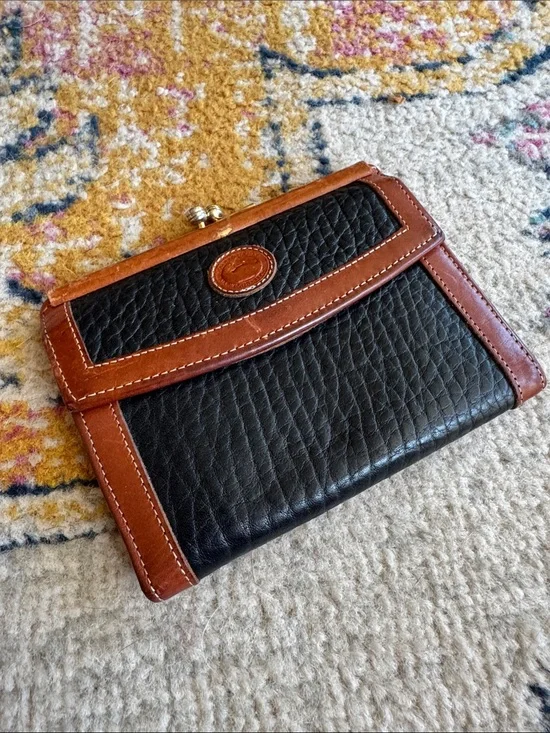 Dooney & Bourke Black Pebbled Leather Wallet with Brown Trim