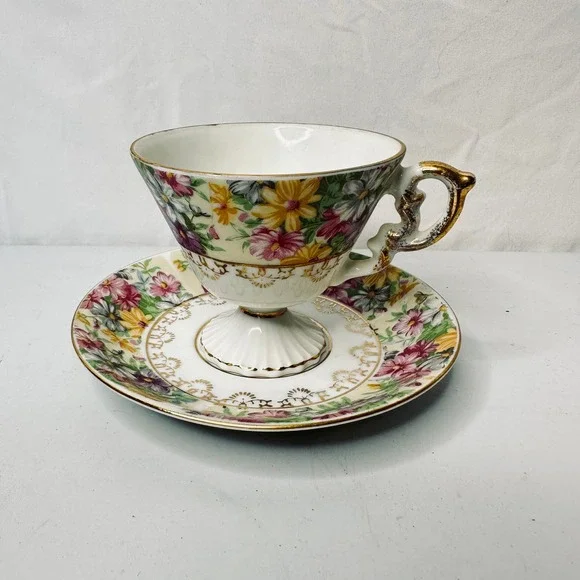 Vintage Enesco Japan Floral Chintz Footed Teacup and Saucer Set Gold Gilt Trim