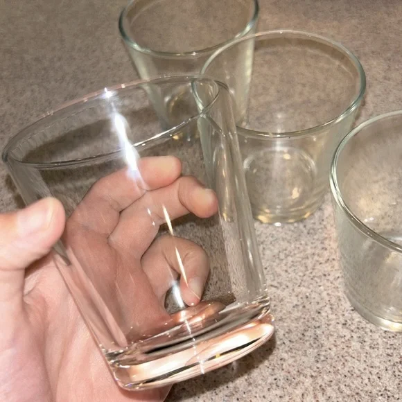 Four small water bottles
