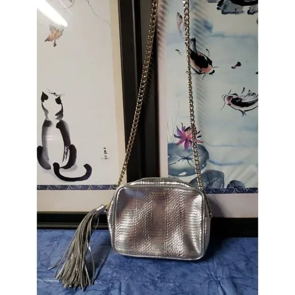 Victorias Secret  Metallic gray chain link gold strap w/tassel‎ crossbody bag