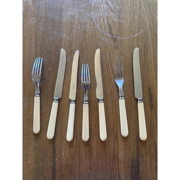 Vintage Universal Resystain Cutlery Set Landers Frary Clark Faux Bone Handle 7pc