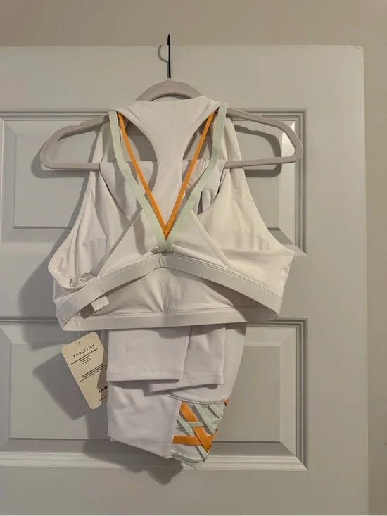 White Strappy Sports Bra with Pastel & Orange Accent
