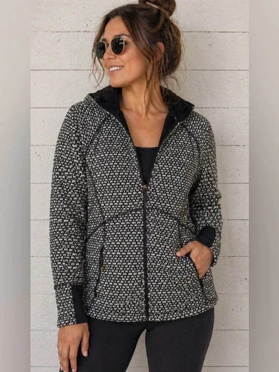 Eddie Bauer, black and white lined acrylic jacket, rounded hem, women’s size M.