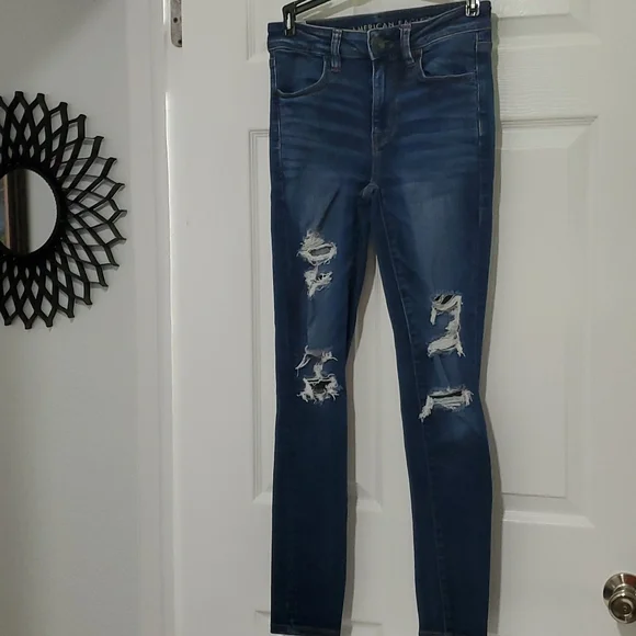 AE NEXT LEVEL STRETCH SIZE 4 HI-RISE JEGGING X RIPPED JEANS