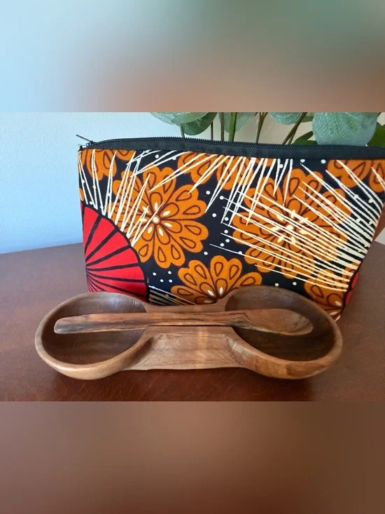 Brand new handcrafted salt and pepper vessel with carrying pouch from Africa
